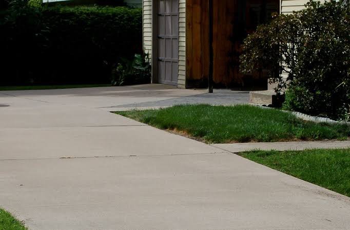 How To Keep Oil Stains off Concrete Garage Floors & Driveways